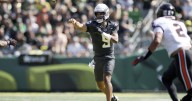 Moore throws career-best 4 TDs and No. 6 Oregon beats rival Oregon State