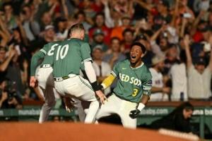 Rafaela hits walk-off triple as Red Sox book MLB playoff berth