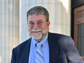 Company news: Oswego’s John Kane earns SUNY Distinguished Service Faculty rank