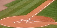 Major League Baseball will use robot umpires to call balls and strikes as part of a challenge system next season