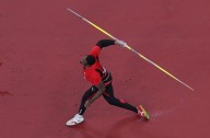 Athletics-Back to the future as Walcott wins javelin gold in Tokyo