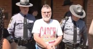 Five children found 'locked in dungeon with cameras to stop them escaping'
