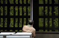 Asian shares to end big central bank week with gains, Nikkei hits record