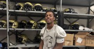 Football star Elyjah Staples embraces his 'family' at Marquez High