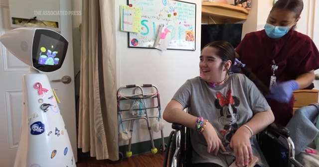 A robot programmed to act like a 7-year-old girl is combatting fear and loneliness in hospitals