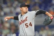 Tigers avoid sweep in Miami, aided by rare three
