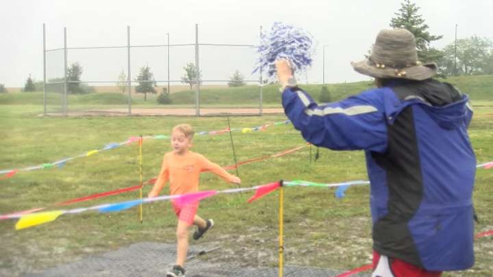 Young athletes complete in Lincoln YMCA's ninth annual triathlon despite downpour