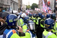 Far-right rally in London draws huge crowd and a counterprotest