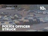Police share video of officer struck by car while trying to arrest suspect