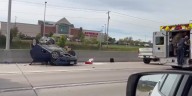 RAW VIDEO: Car flipped over in crash on West Dodge