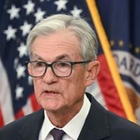 Powell warns of inflation risks if US Fed cuts rates 'too aggressively'
