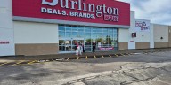 Burlington holds grand opening in new location, presents check to elementary school