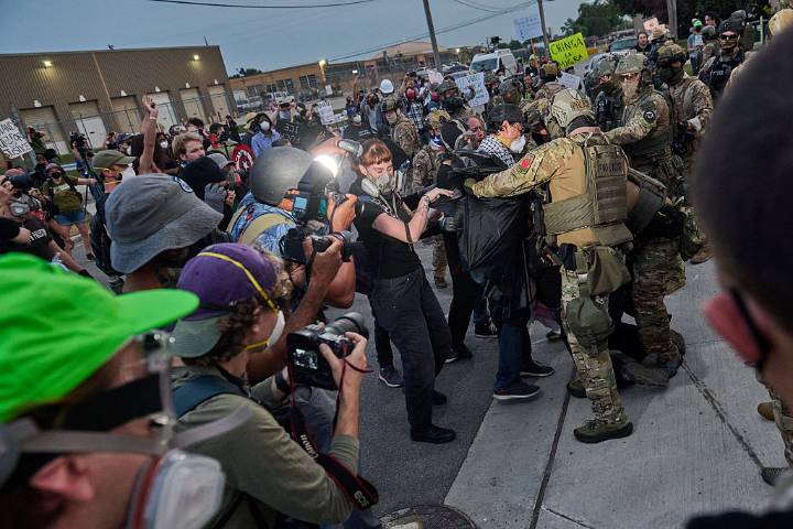ICE in Chicago with “excessive force and intimidation tactics”
