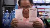Rush to buy Powerball tickets heightens as jackpot grows near $1.5B