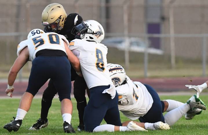 Photos of Clawson at Madison Heights Madison in a MAC Bronze football matchup