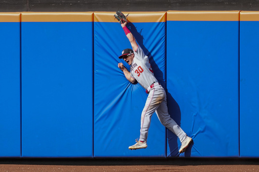 Fancy footwork: Young's spectacular catches in center lead Nationals past Mets