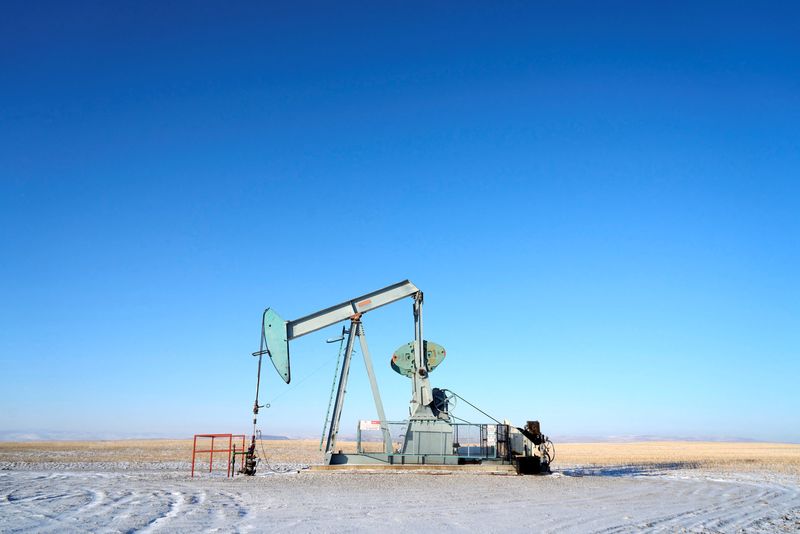 Oil gains, lower US crude stockpiles provide floor