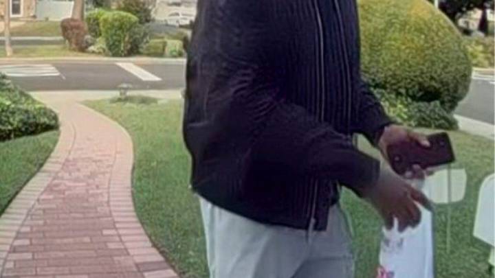New York City police hunt for man suspected of killing elderly couple and burning their home