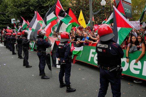 Spanish Vuelta stage cut short because of disruption by pro-Palestinian protesters near finish line