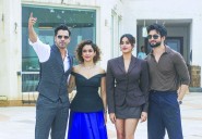 Actors Varun Dhawan, Janhvi Kapoor, Sanya Malhotra, and Rohit Saraf pose for a photograph