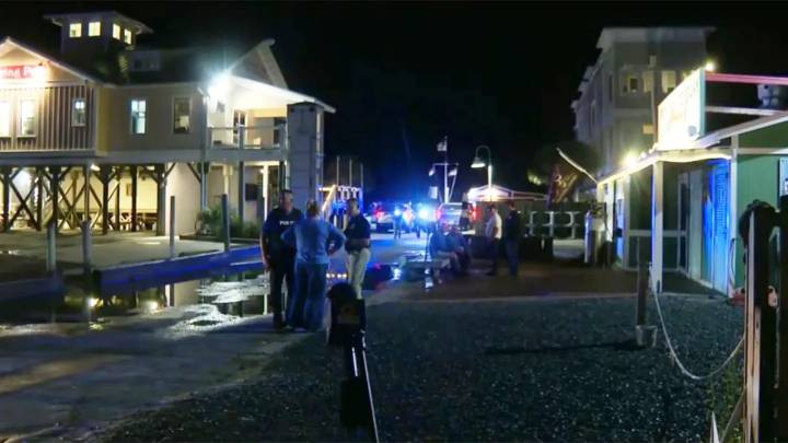 Suspect in custody after gunman fires from boat into restaurant, killing 3