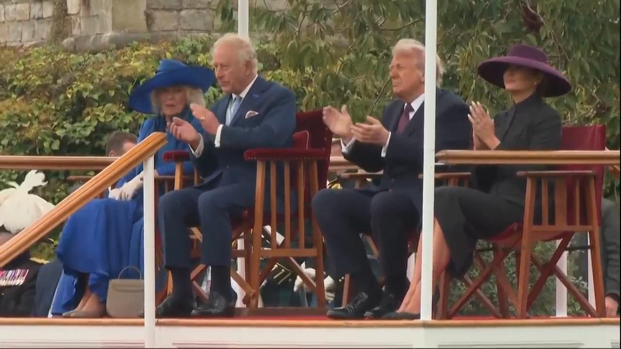 Trumps and UK King and Queen watch military parade and flypast at Windsor Castle