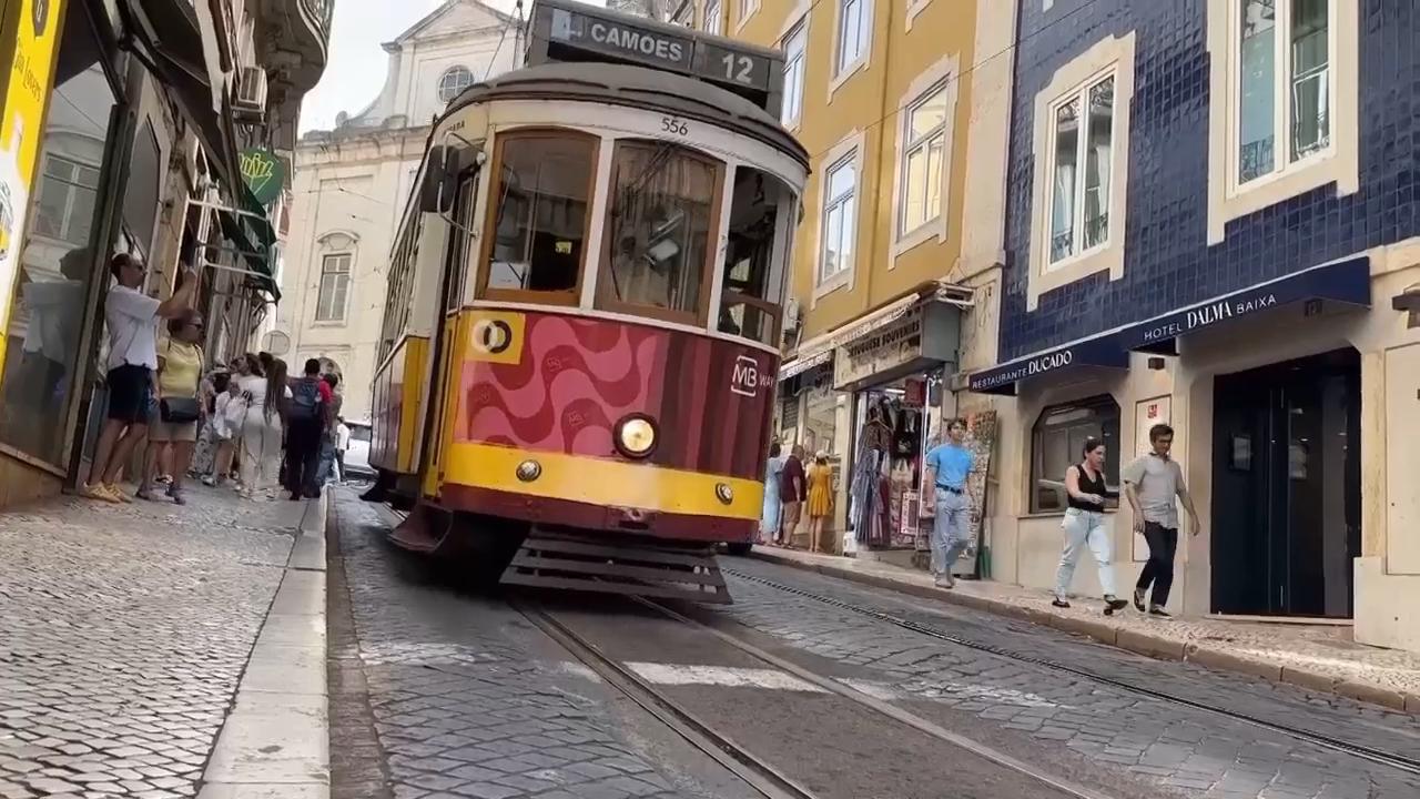 Tourists in Lisbon undeterred by streetcar crash which killed 16 people