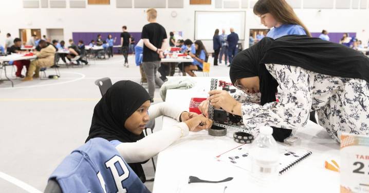Building a robot at the Kids Robotics Workshop at New Haven Jr./Sr. High School