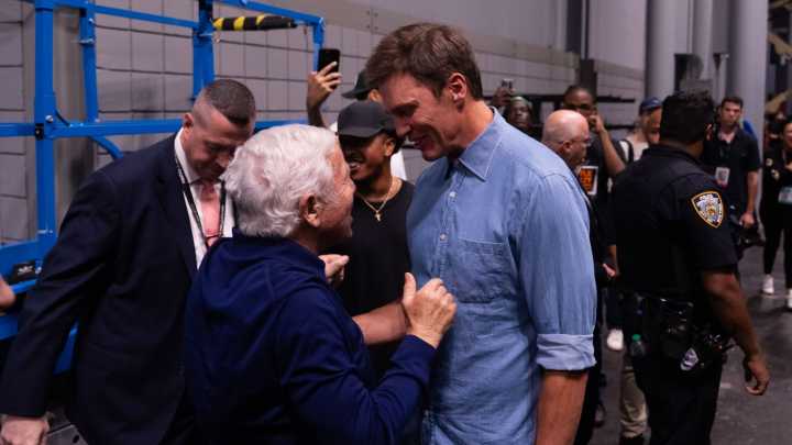 Robert Kraft makes $900,000 bid to play golf with Tom Brady after helping raise $20m at star