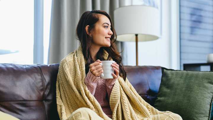 Should You Wash Throw Blankets More Often In The Fall? Here's What Pros Say