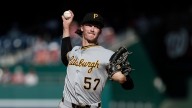 Chandler tosses five perfect innings, Pirates rally in eighth for 5