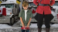 Royal Mounties Arrest Child Playing With Toy Semi