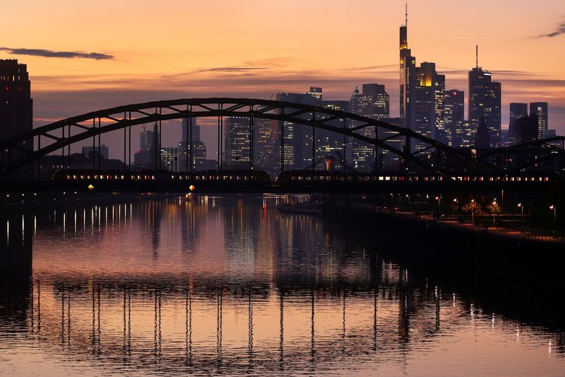 Euro zone industrial output inches up but remains weak