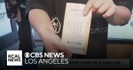 Hopeful winners rush to buy tickets as Powerball jackpot swells to $1.8 billion