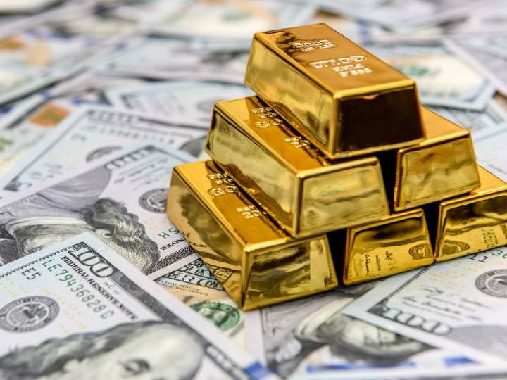 Gold surges to record on weaker US dollar, risk of shutdown