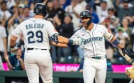 Behind Cal Raleigh's 60th homer, Mariners clinch first AL West crown since 2001