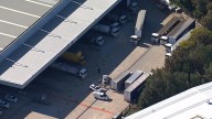 Truck driver killed after being struck by forklift while working at Menzies Aviation warehouse in Matraville, Sydney