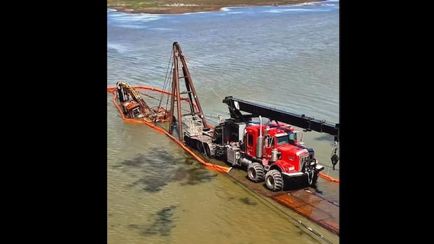 Excavator that fell through ice and was stranded in Quill Lakes for over a decade finally pulled out