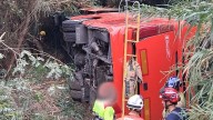 10 people injured, two in serious condition, after coach overturns in Catalonia