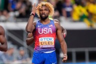 Lyles wins his fourth 200-meter world title. Jefferson-Wooden completes a sprint sweep