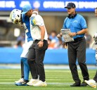 Chargers’ Najee Harris helped off field after injuring ankle against Broncos