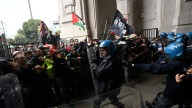 Pro-Palestine riots break out in Italy as metal ladders are thrown into windows & protesters storm iconic train station
