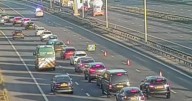 Driver killed after horror central reservation crash on M60