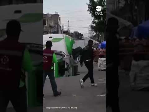 Soda delivery truck falls into sinkhole in Mexico City