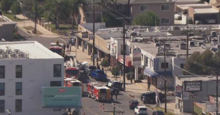 Man injured after 2 vehicles crash into building in Valley Glen