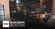 Driver cited for driving with no license after car smashes through smoke shop in Brockton