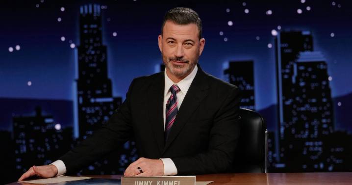 Audience members react after Jimmy Kimmel returns to air
