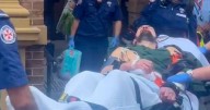 Bloodied murderer leaves in ambulance, not prison van