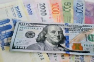 El dólar cerró a $1.485 y alcanzó el techo de la banda de flotación