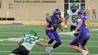 Watertown quarterback Markus Pitkin find some running room